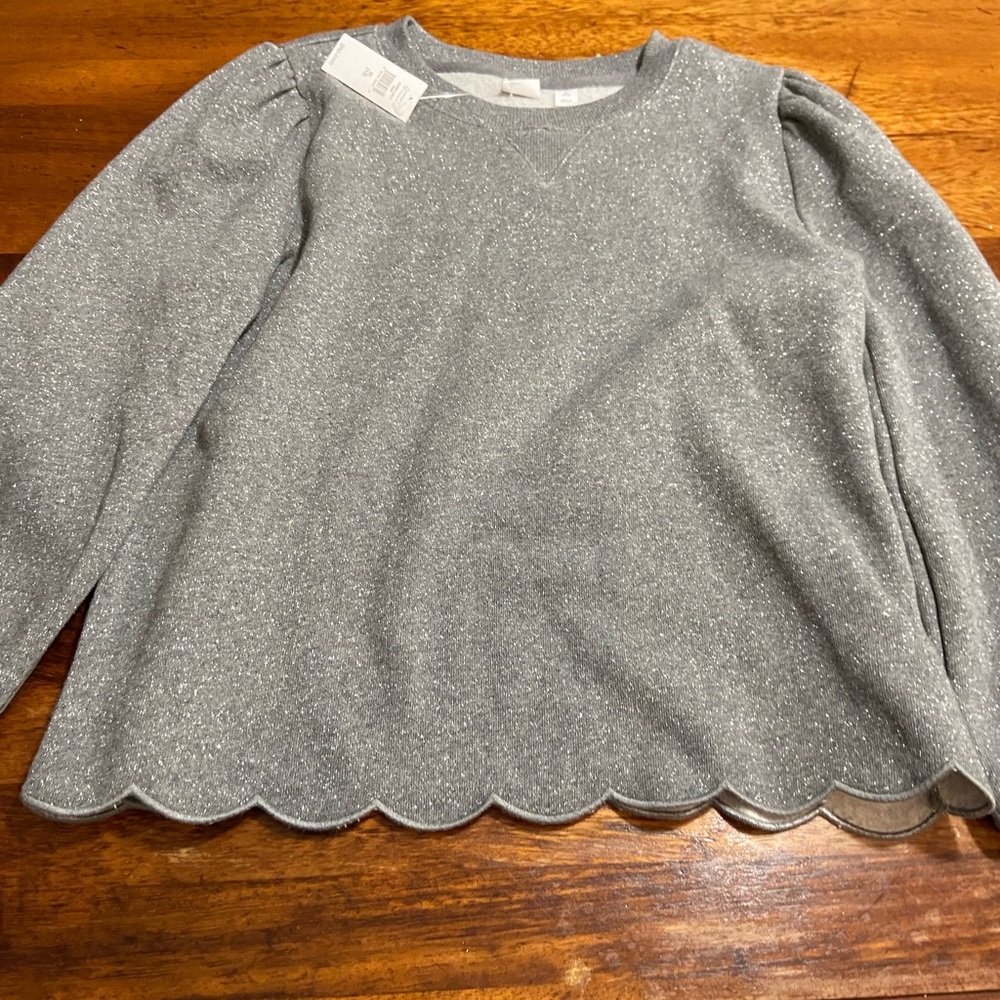Brand new with tags Gap sparkly sweatshirt w scalloped hem and puff shoulder